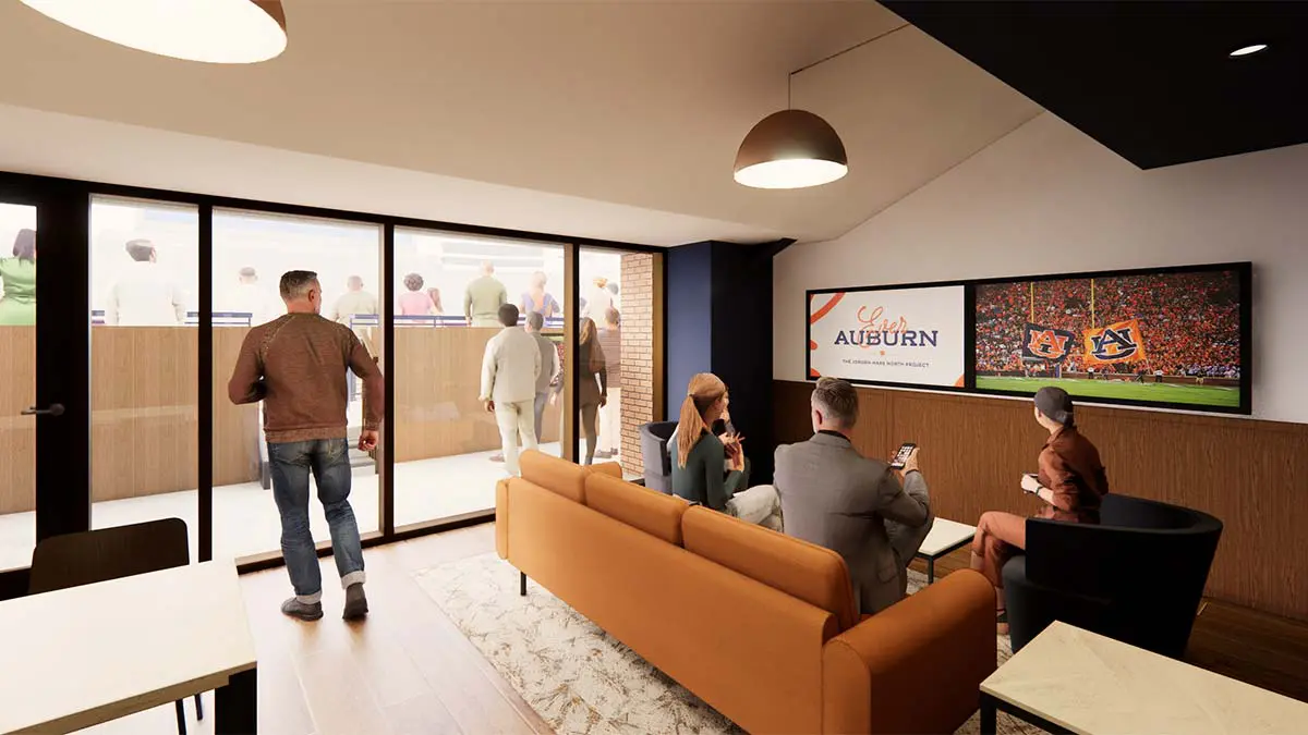 Rendering of a Stadium-View Meeting Room lounge with sofa seating, large screen, and glass doors to the stadium